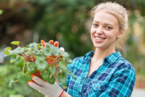 Professional landscaper planning a garden design in Mottingham