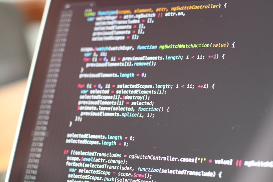 A close-up image of a computer screen displaying colorful lines of code in a programming language, with syntax highlighting in shades of pink, blue, green, and yellow. The code appears to be related t